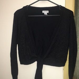 Three quarter length black shrug.